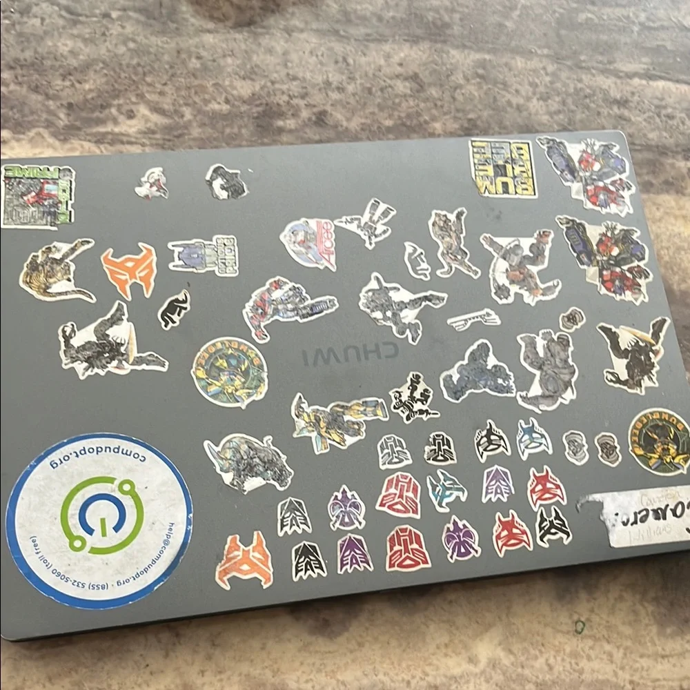 Gray Laptop with Stickers
